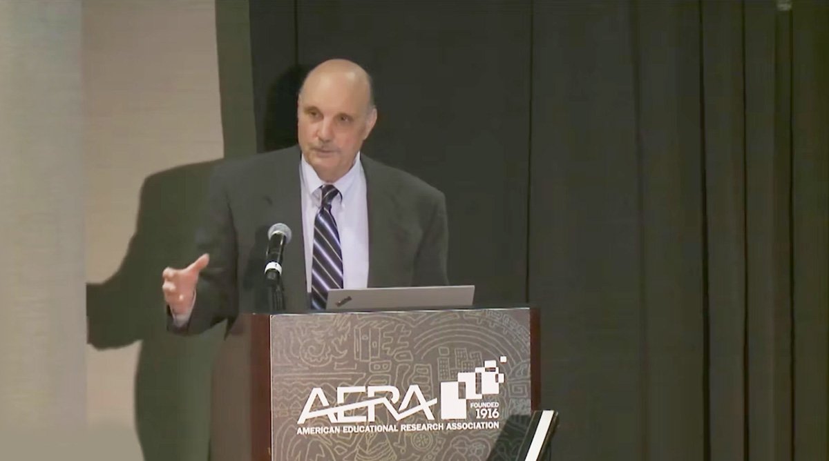 Mike Kirst speaking at the 2018 AERA Annual Meeting
